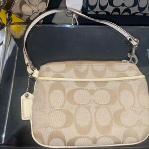 Coach Beige Signature monogram wristlet